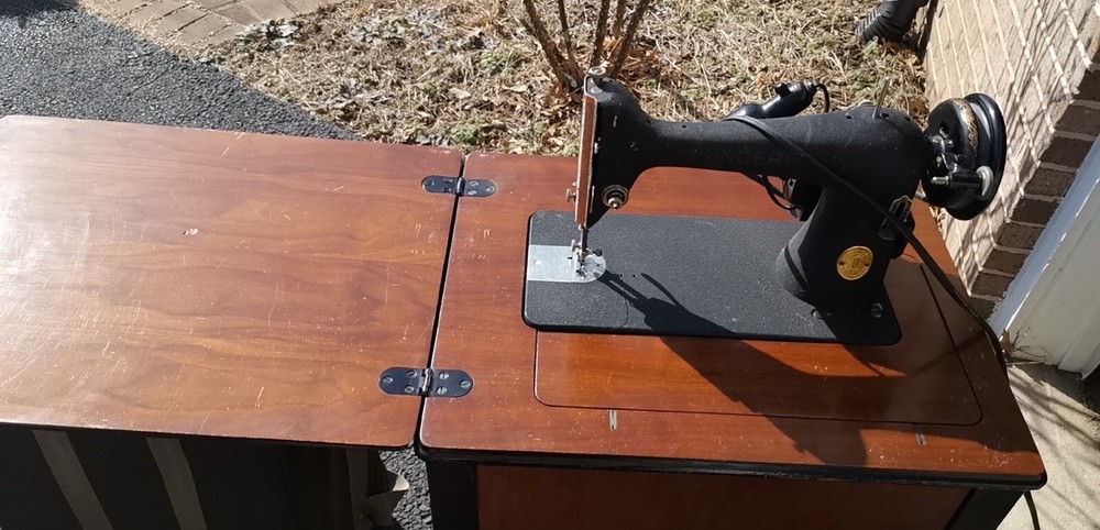 Old Singer Sewing Machine With Its Own Table