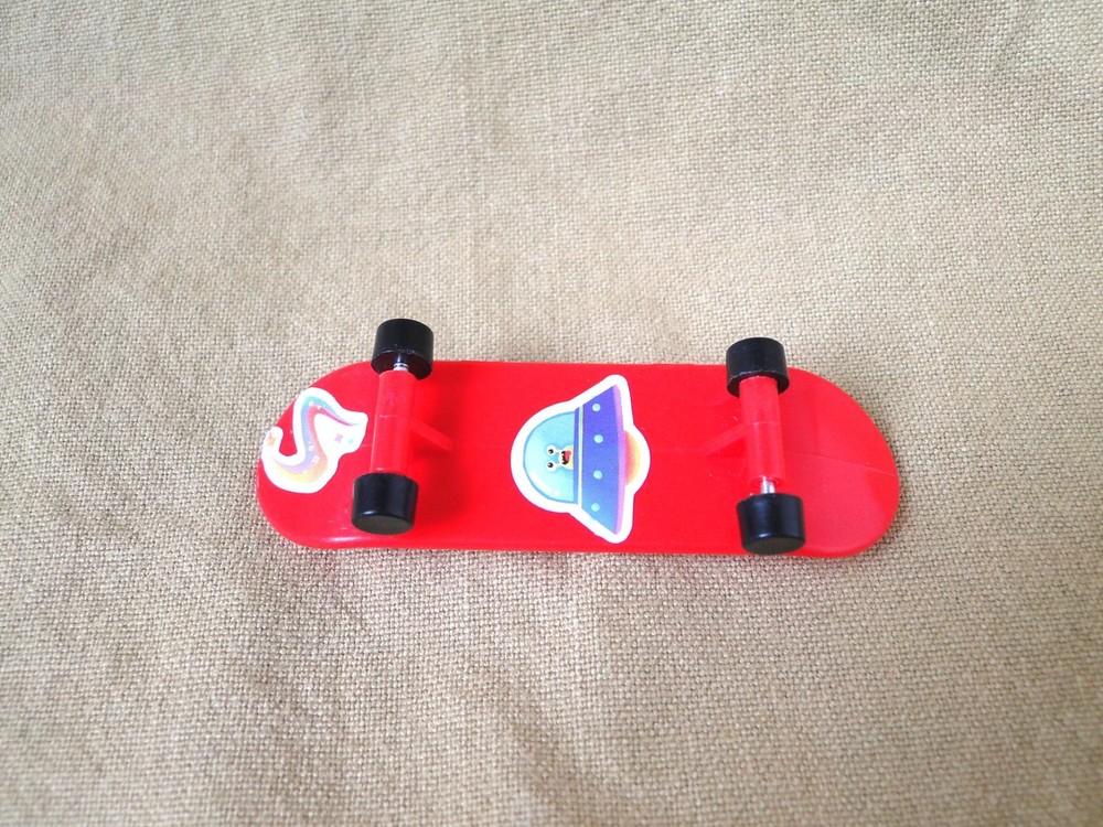 Mini Red Plastic Skateboard