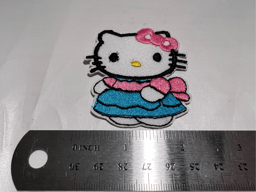 Hello Kitty with a Dress On Iron on Patch