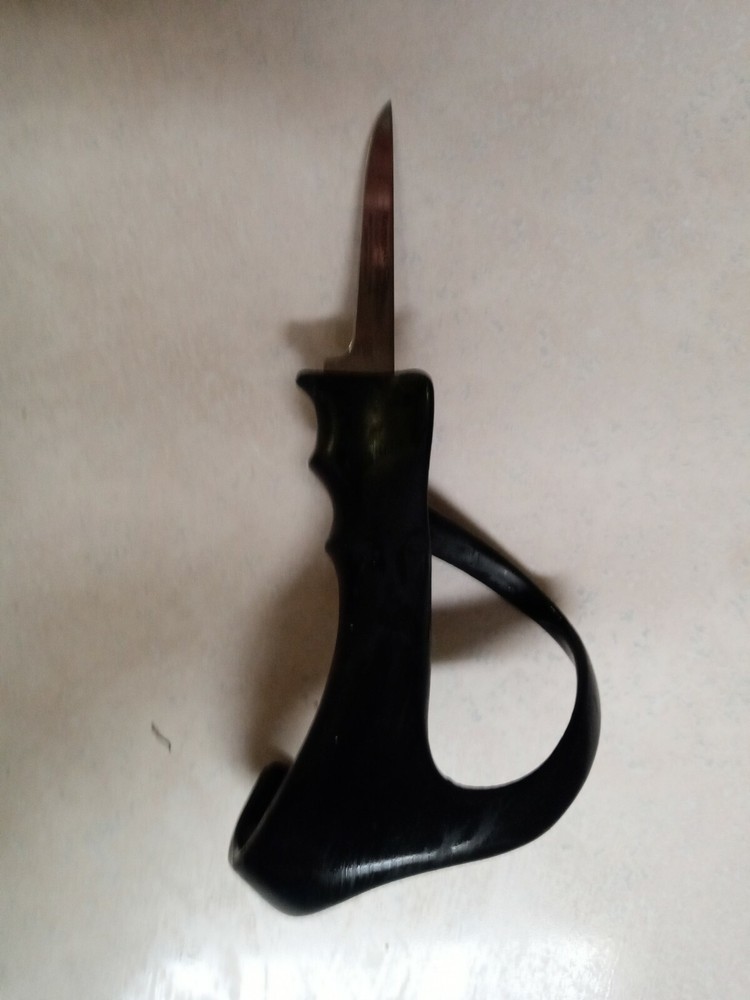 Unique NATURAL-CURV deboning knife. Wrap around rubber handle.