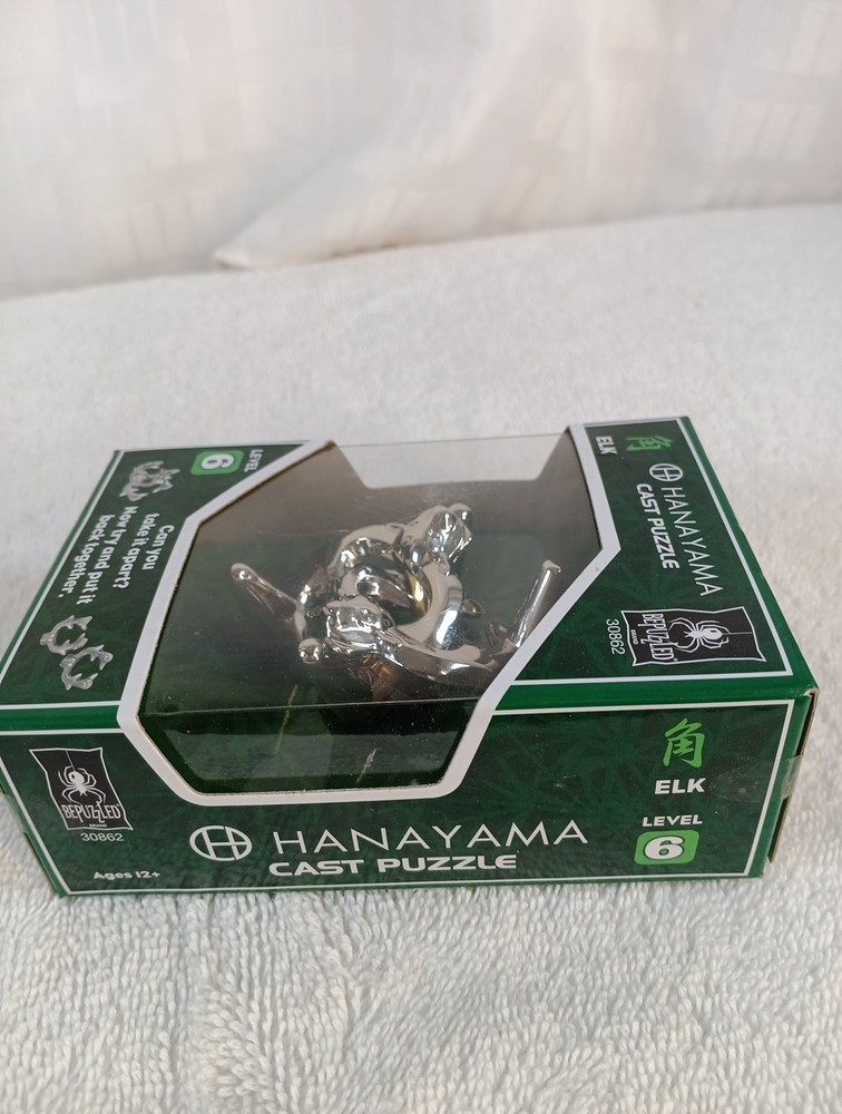 Hanayama Cast Puzzle Model: "ELK" Level: 6