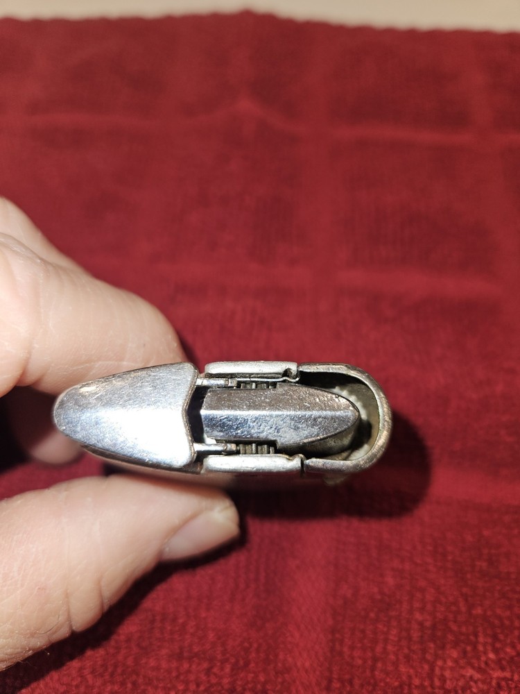 7 sitesVintage Ronson Standard or Adonis pocket lighter.