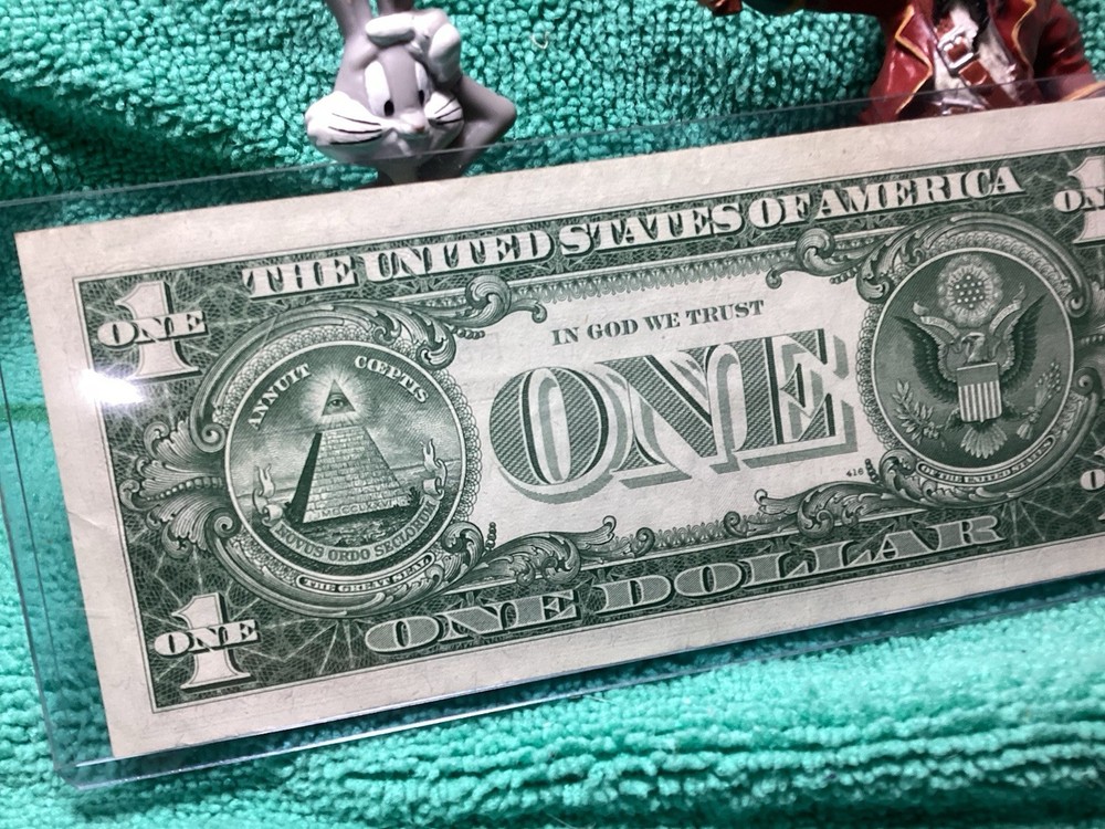 1957 A SILVER CERTIFICATE UNCIRCULATED in RIDIG HOLDER