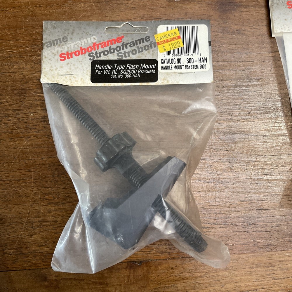 NOS LOT STROBOFRAME CAMERA FLASH MOUNTS ETC