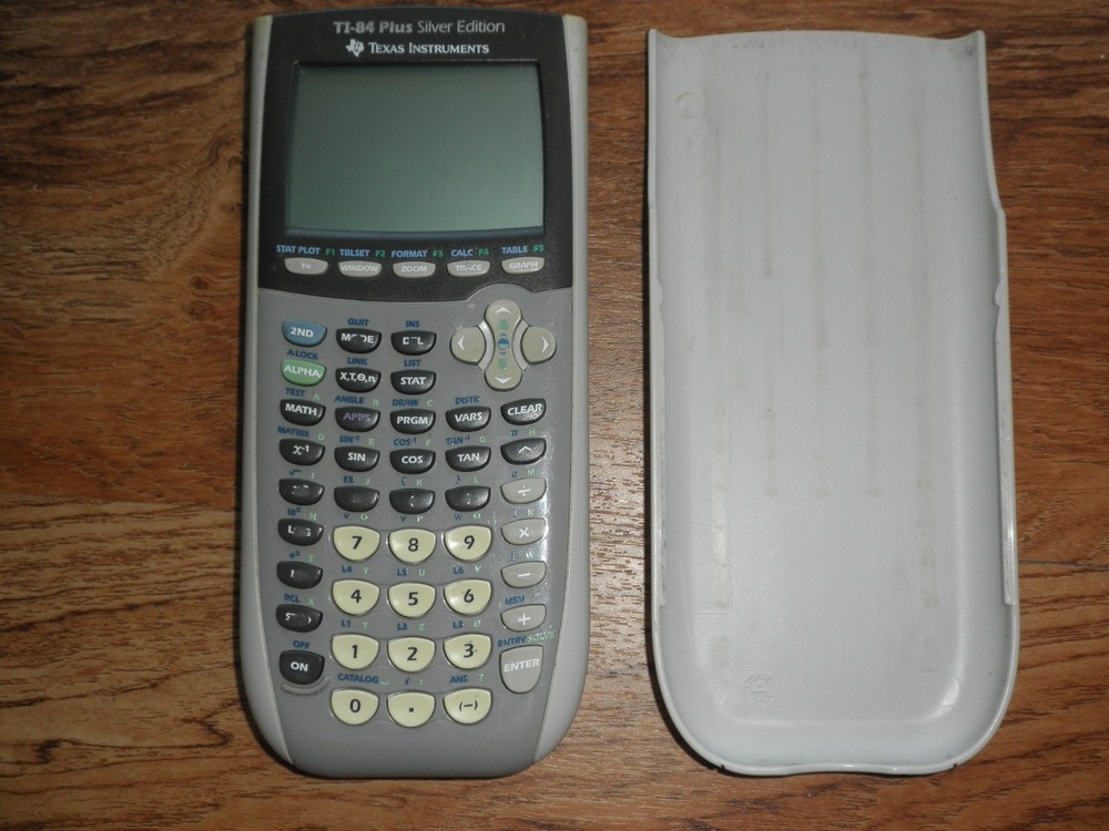 Texas Instruments TI-84 Plus Silver Edition Graphing Calculator + Accessories