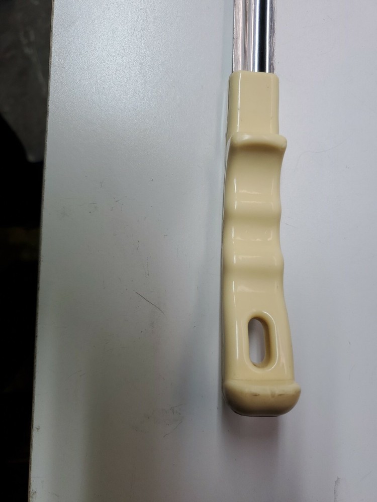 Winco - FPS-3 - 3 oz Beige Solid Portion Spoon