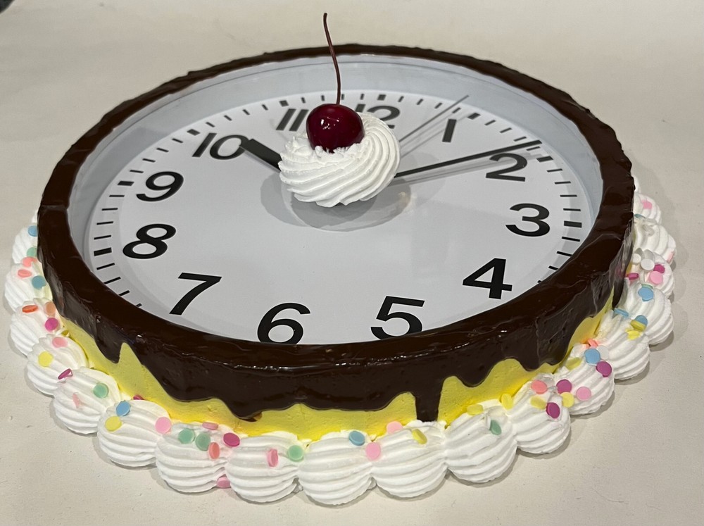 DEZICAKES Cake Wall Clock Yellow