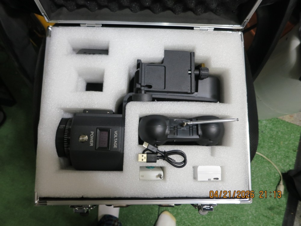 Remote control pan/tilt for camera light scopes