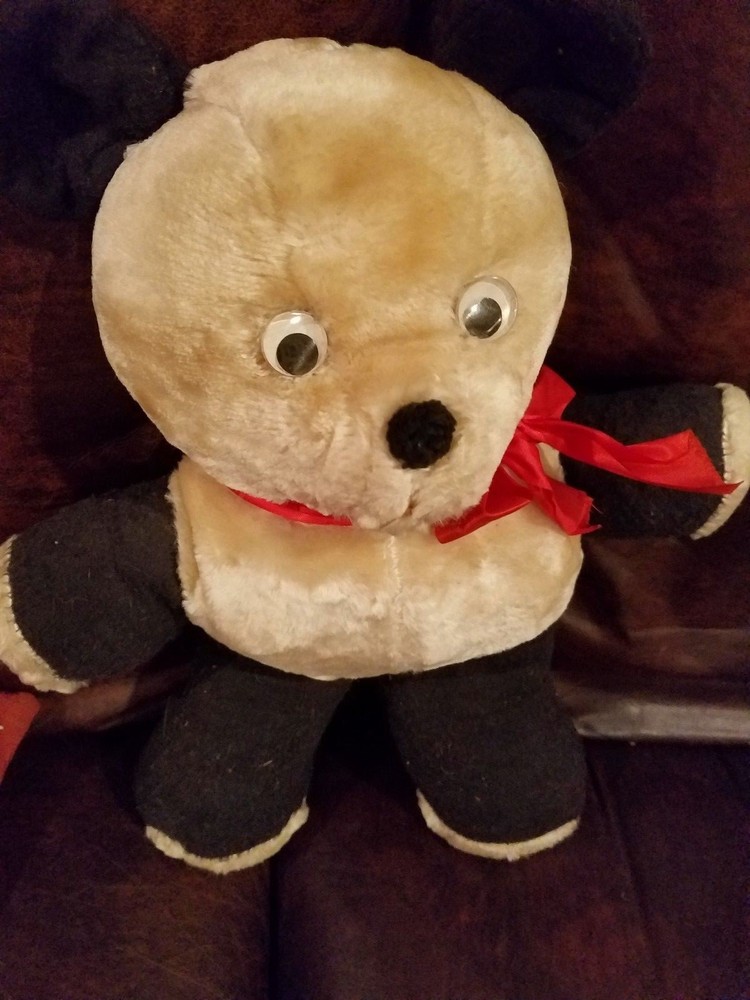 *Antique? Black and White Bear 14" with leg tear