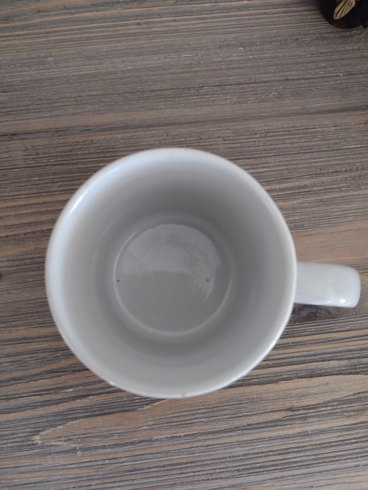 VINTAGE OFF DUTY SANTA MUG