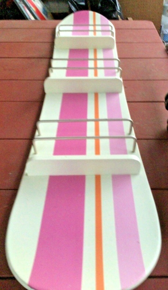 COMIC BOOK OR MAGAZINE RACK SNOWBOARD DESIGN
