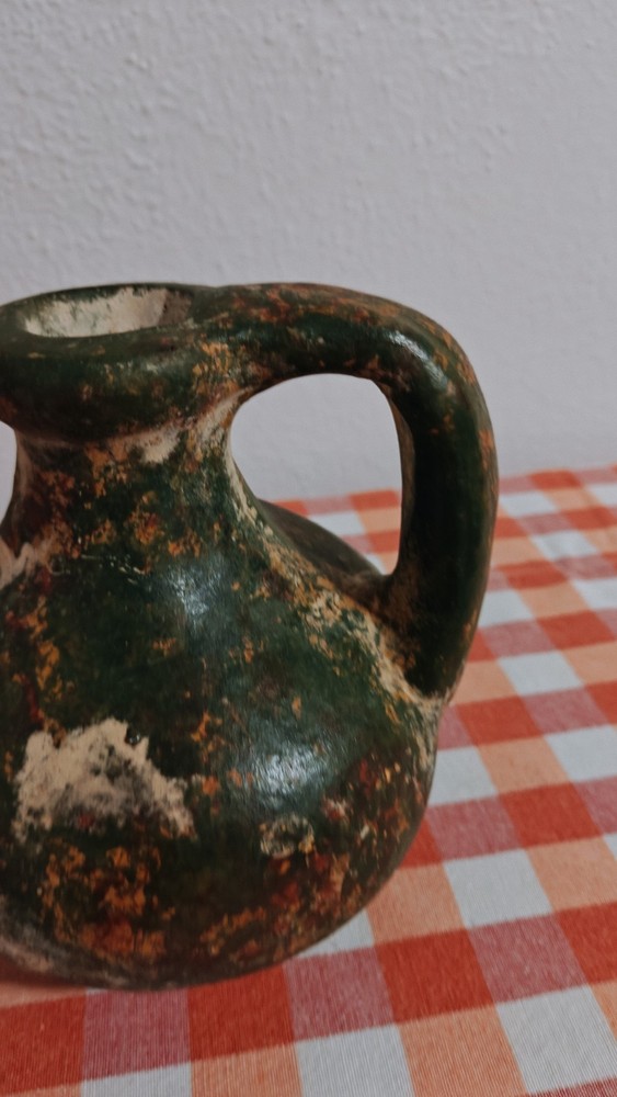 Ancient Clay Pitcher