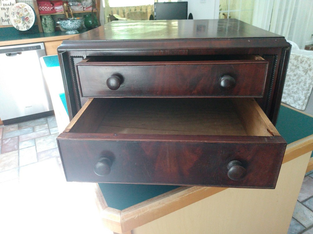 Antique two drawer drop leaf spool thread cabinet