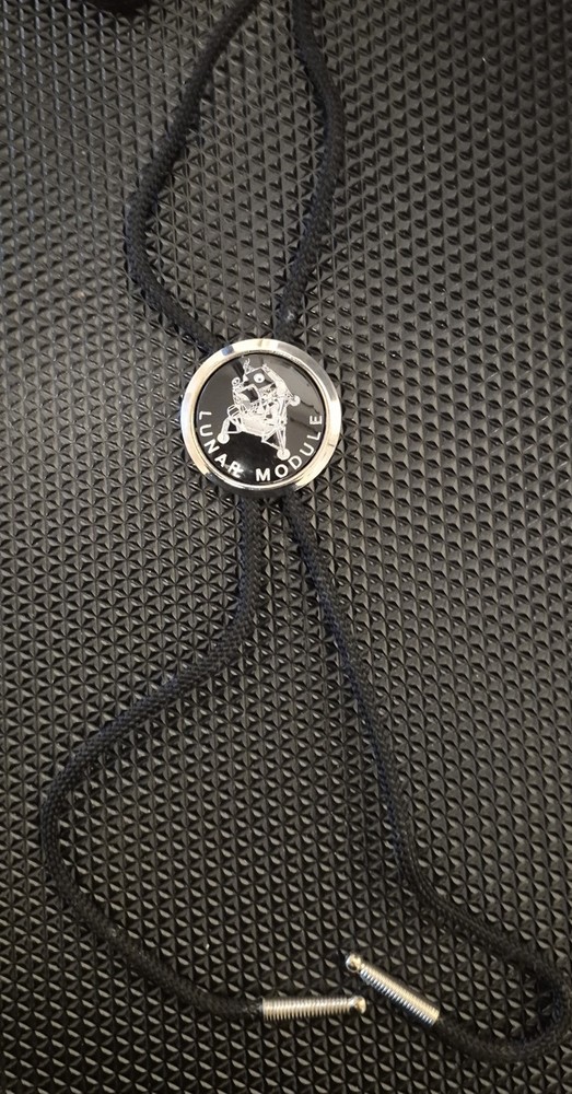 Bolo tie with a "Lunar Module" emblem