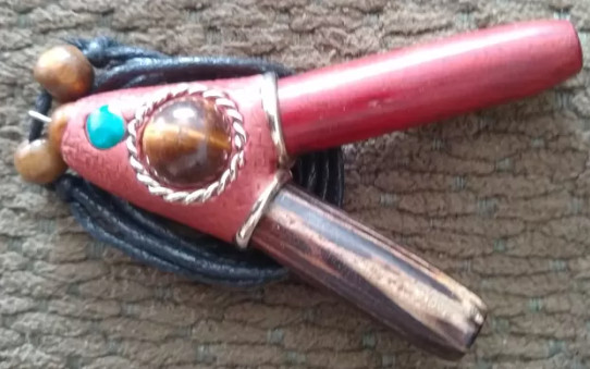 Beaded wooden kuripe with string