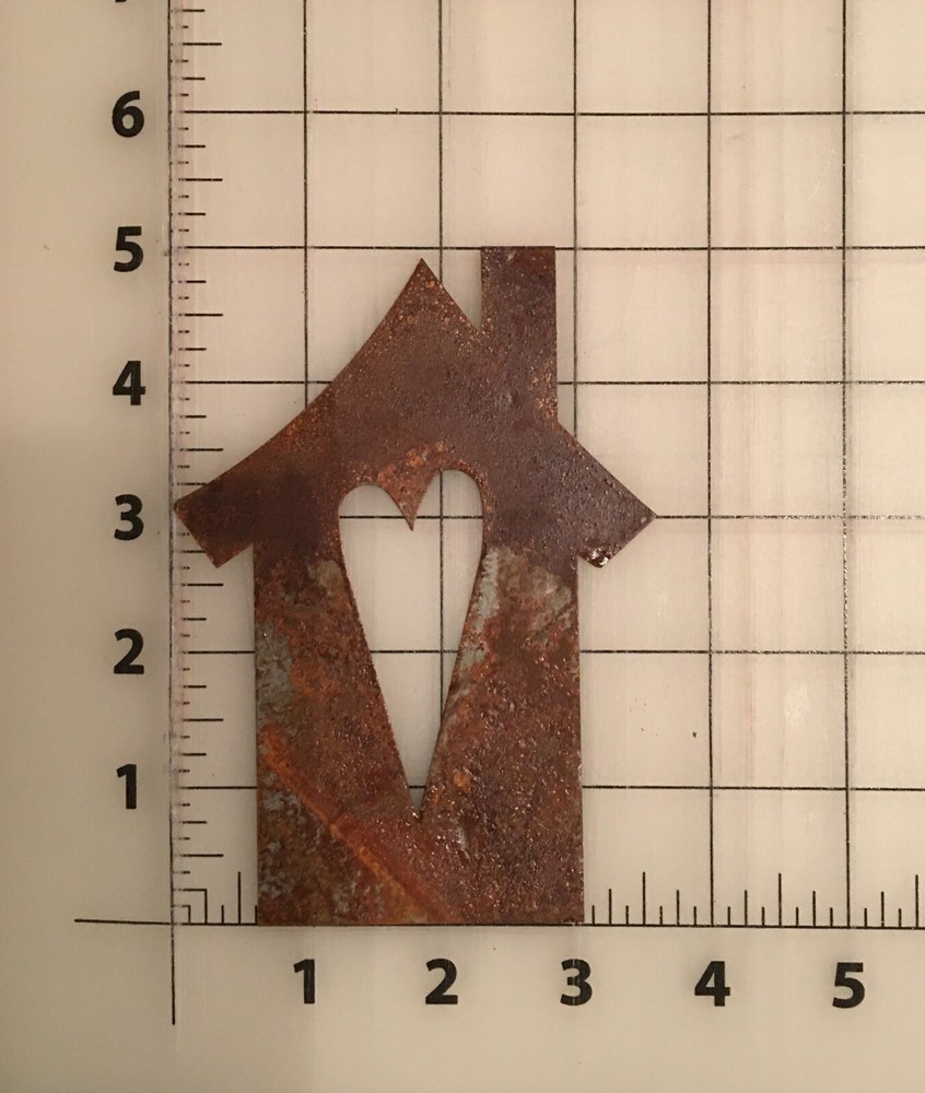 Rusty Tin House with Heart Cutout