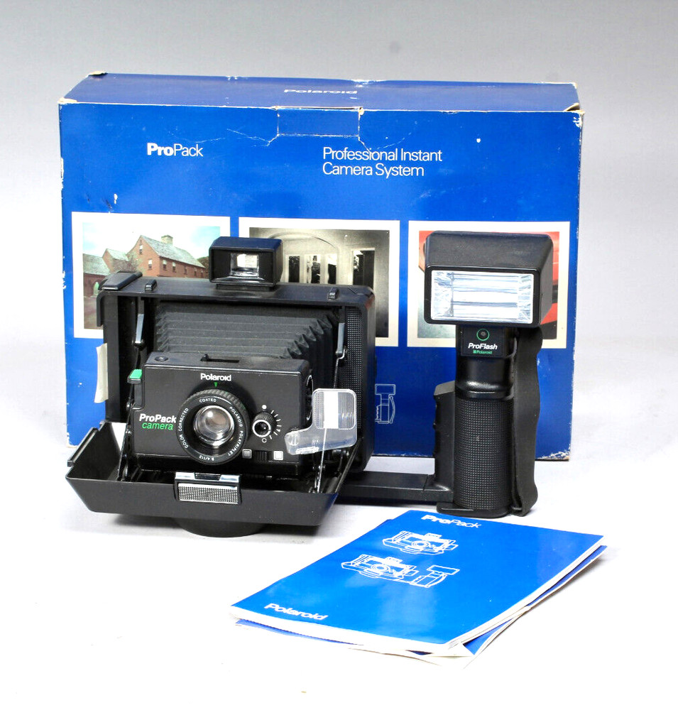 POLAROID PRO-PACK IN THE BOX W CAMERA FLASH STRAP & MANUALS FLASH BAD