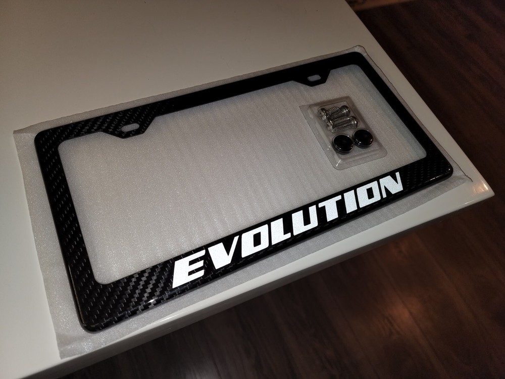 Reflective White Lacer Evo / Evolution 100% Carbon Fiber License Plate Frame