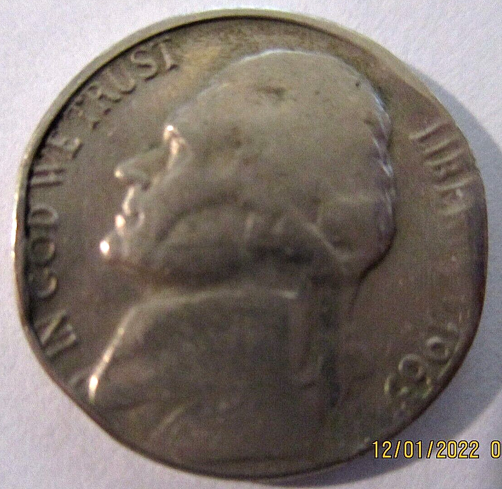 1963 D nickel with die/mint damage, missing letering, m272