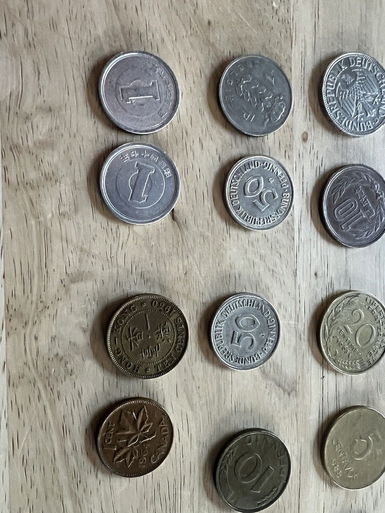 Assorted foreign coins. 26 Coins In Total