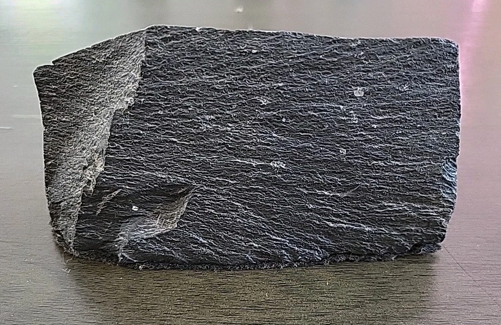 Vintage Desktop Thermometer on Jagged Stone.