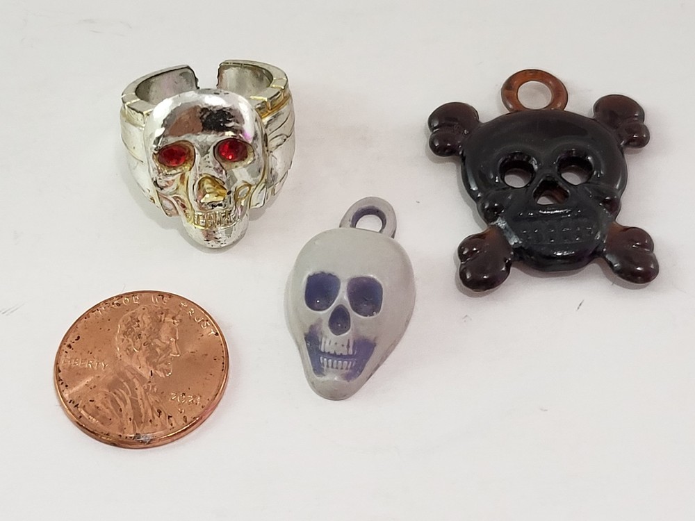 Vintage Plastic Skull Ring And (2) Skull Charms