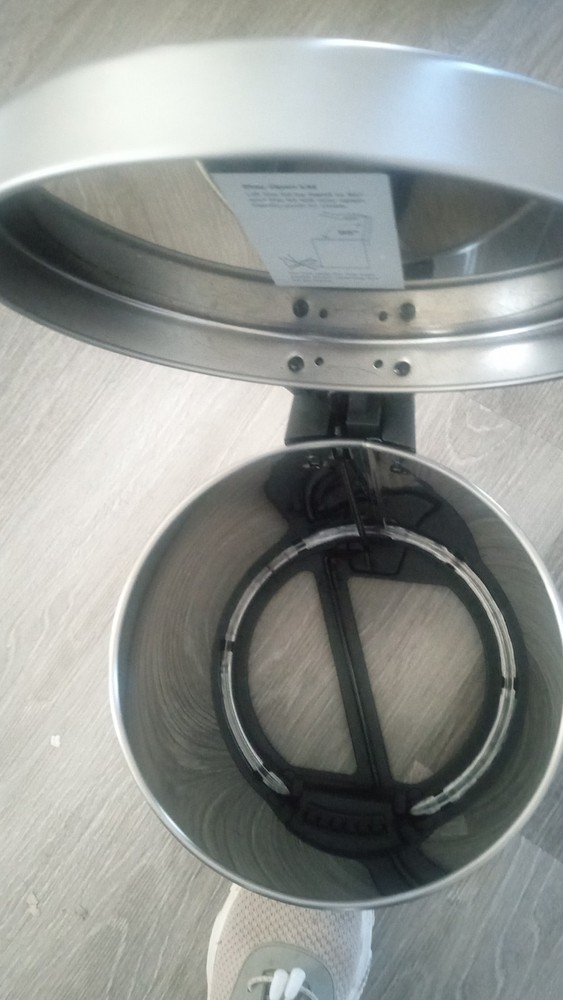 Small gray trash can