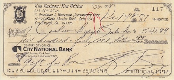 KIM BASINGER signed bank check