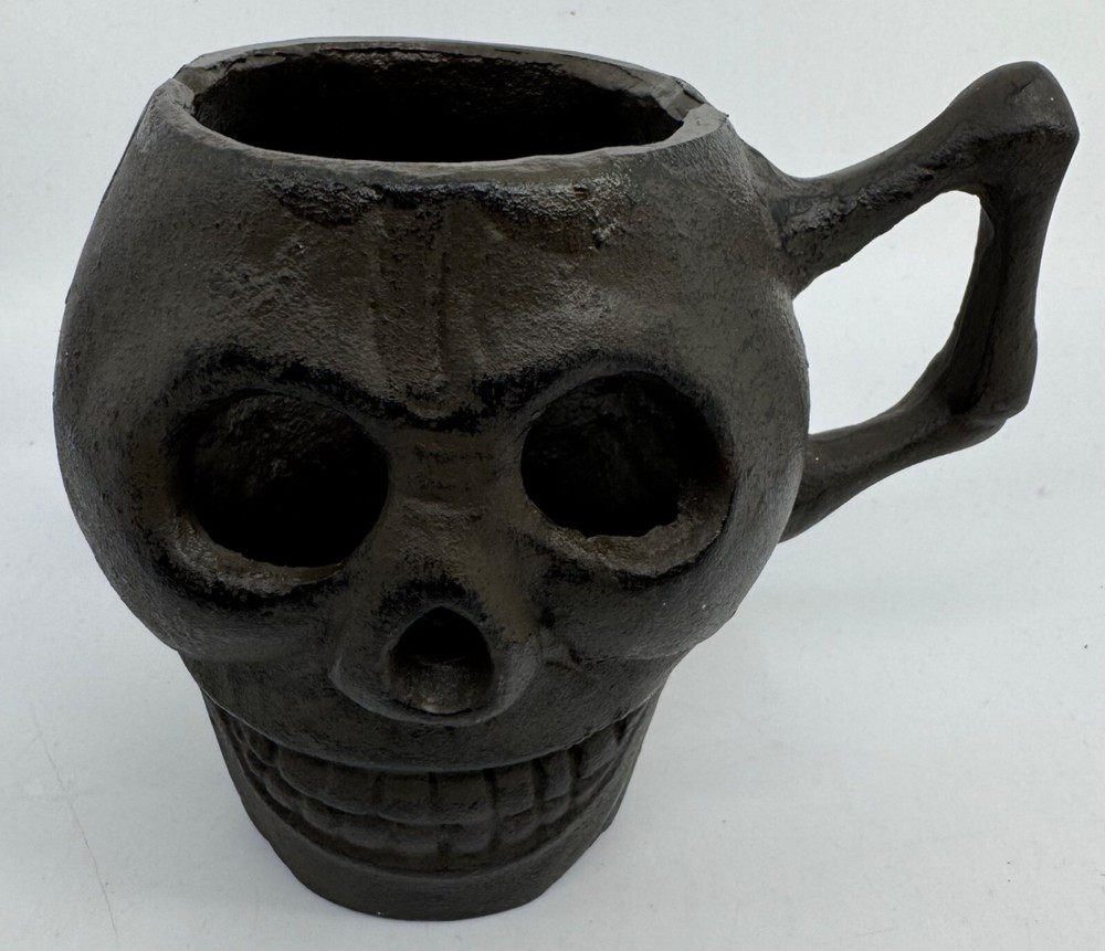 Cast Iron Skull-Shaped Bottomless Mug Thingy With Handle Both Ends And Eyes Open