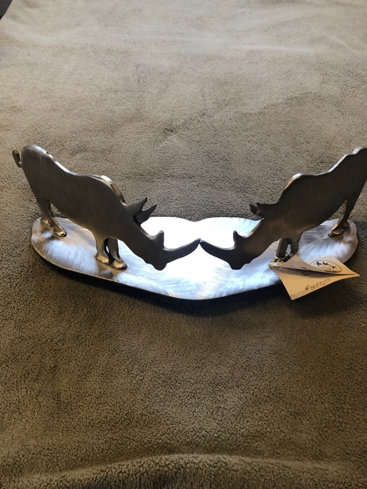 Two Stainless Steel Rhinoceroses Sculpture