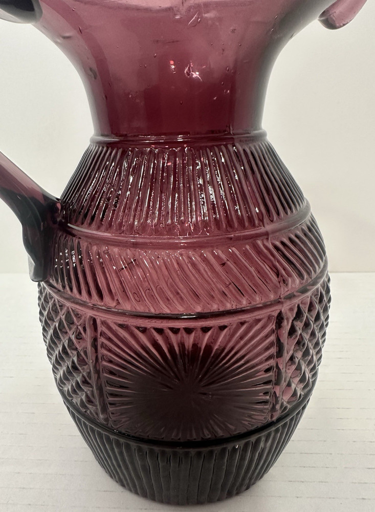 Vintage Amethyst Glass Pitcher With Embossed Design & Applied Handle 8"