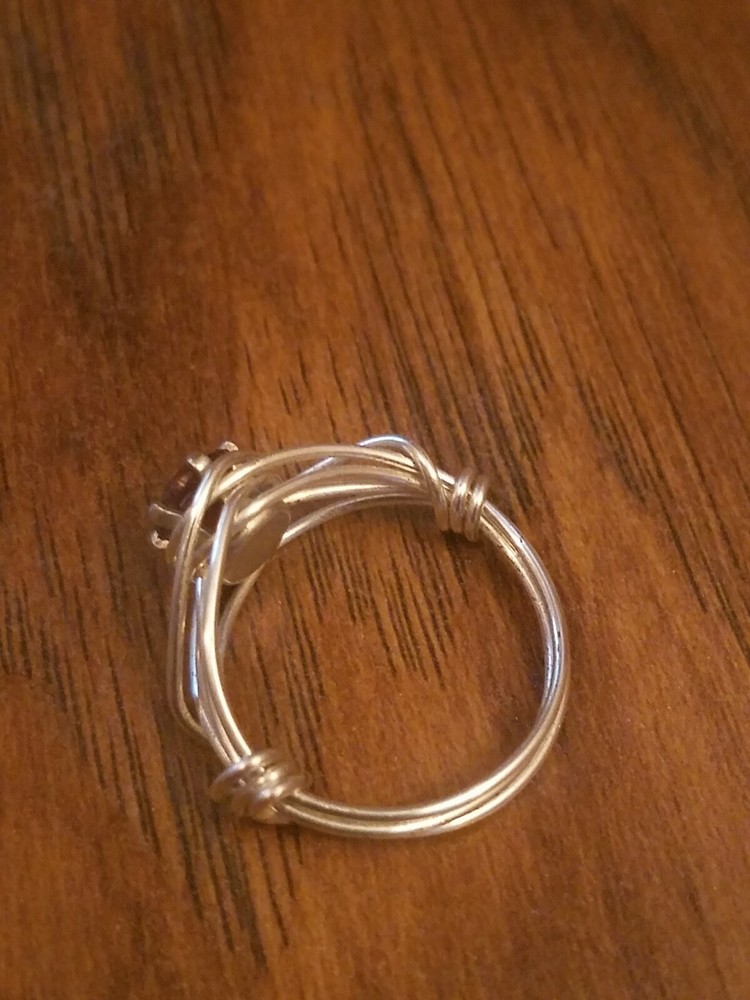 Wire wrapped ring with 6mm garnet CZ size 6.5 - 7