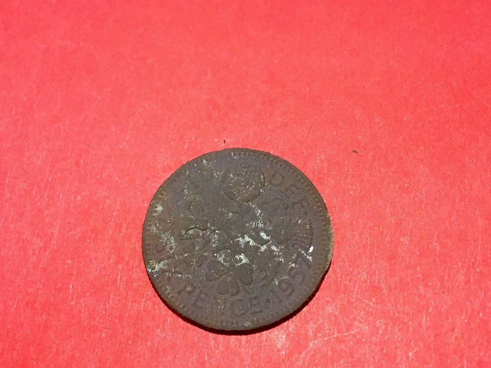 SIXPENCE 1957