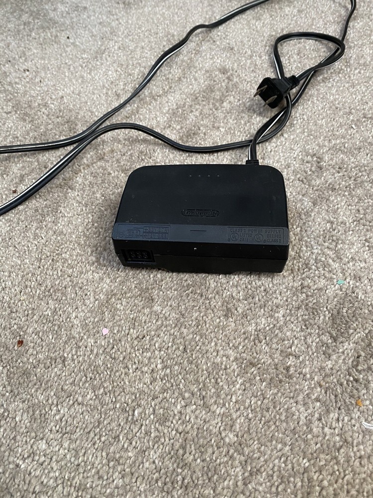 nintendo 64 console with hookups and 1 controller