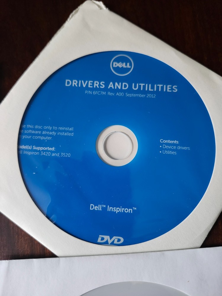 assorted computer installation and program discs