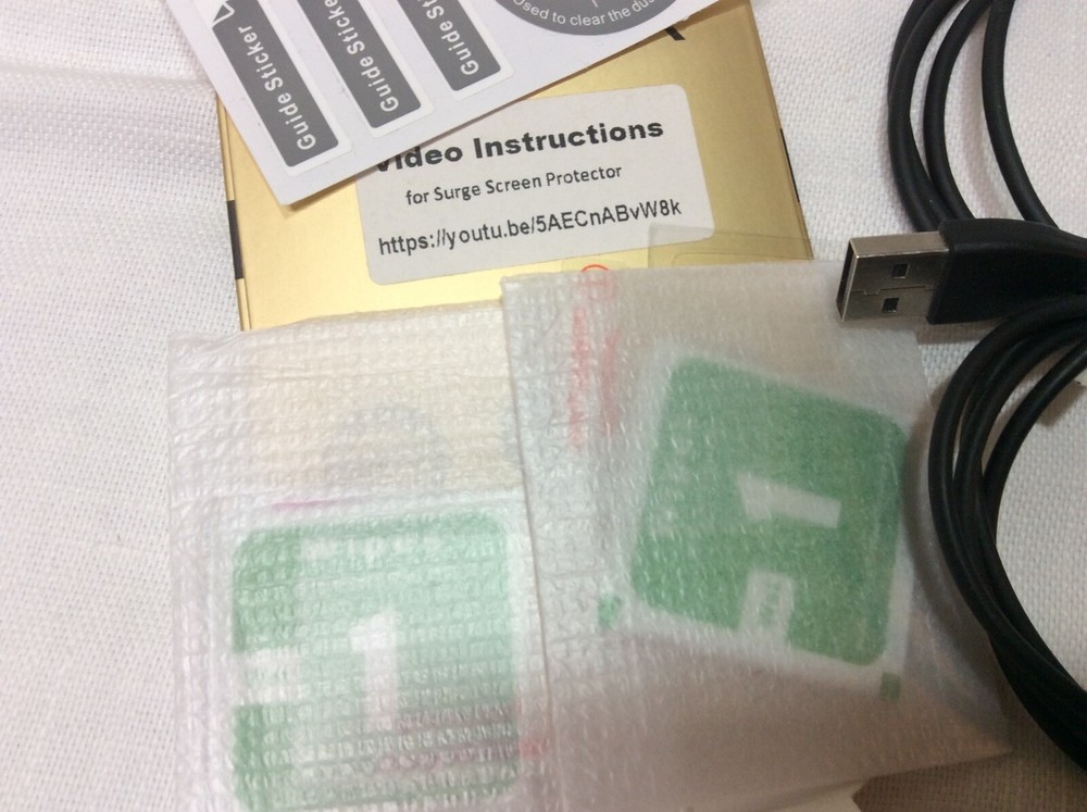 Mixed lot for Fitbit Surges - charging cables, screen protector, silicone covers