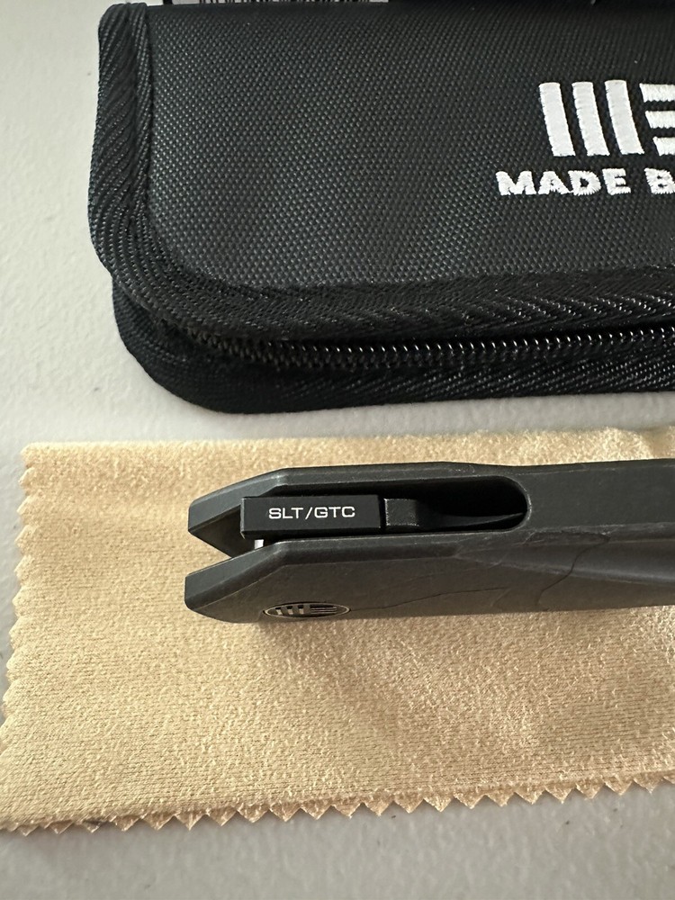 We Knife Solid Flipper Black Etch Integral Ti Handle & Black Etch 20CV WE22028-5