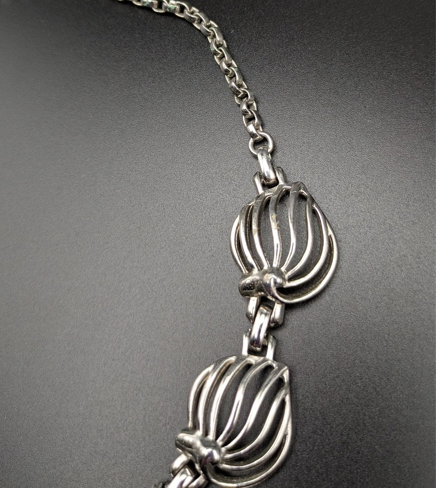 Silver-Toned Bracelet and Necklace Set Featuring Abstract Leaf Patterns