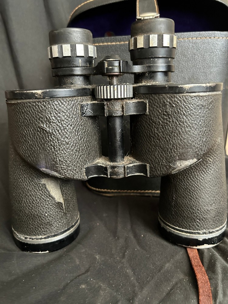 Vintage Adams binoculars with leather case