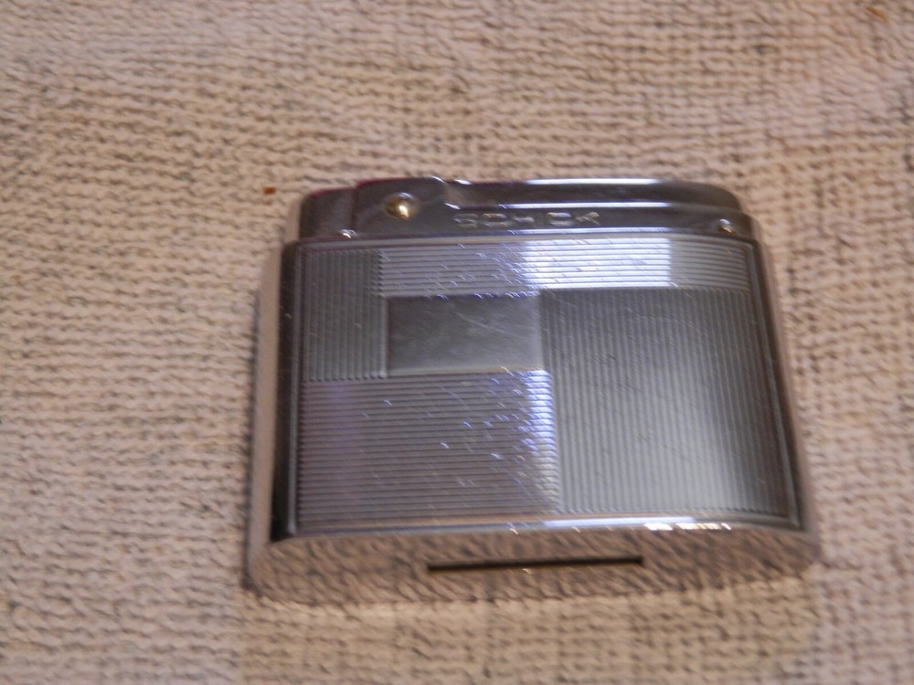 Schick Hentley Lighter (empty)