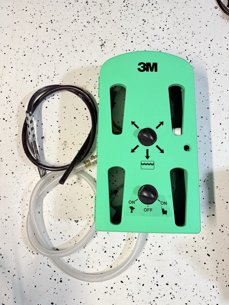 3M Flow Control System chemical dispenser, a wall-mounted.