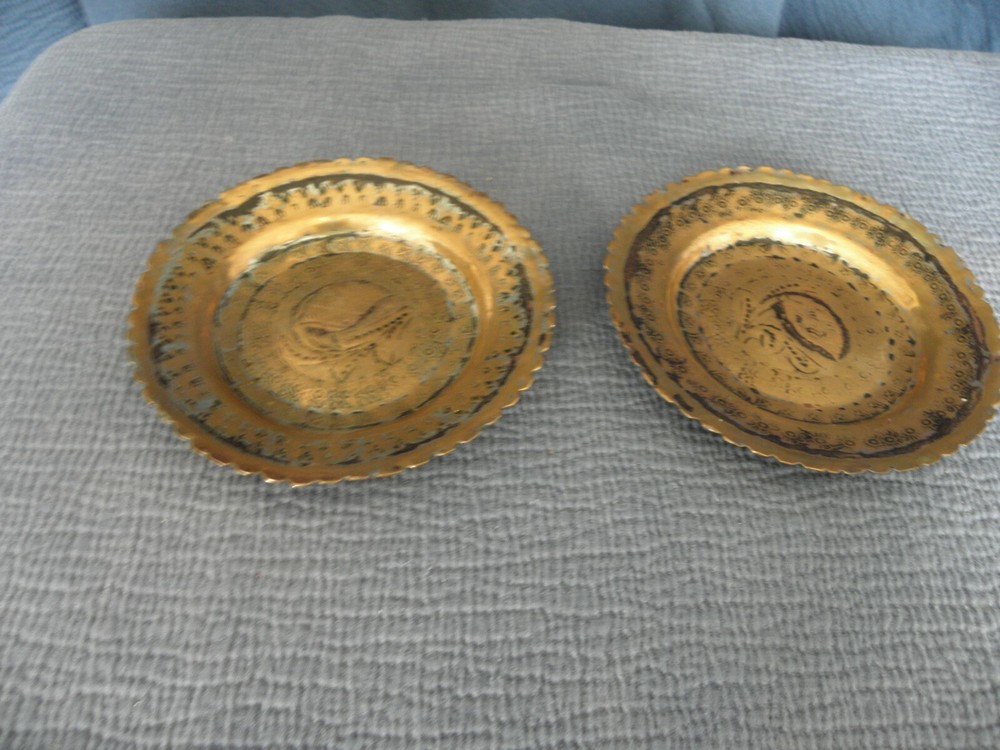 Pair of copper Middle Eastern dishes, both signed