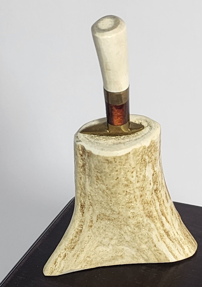 Small Knife In Bone looking Holder With Wolf On