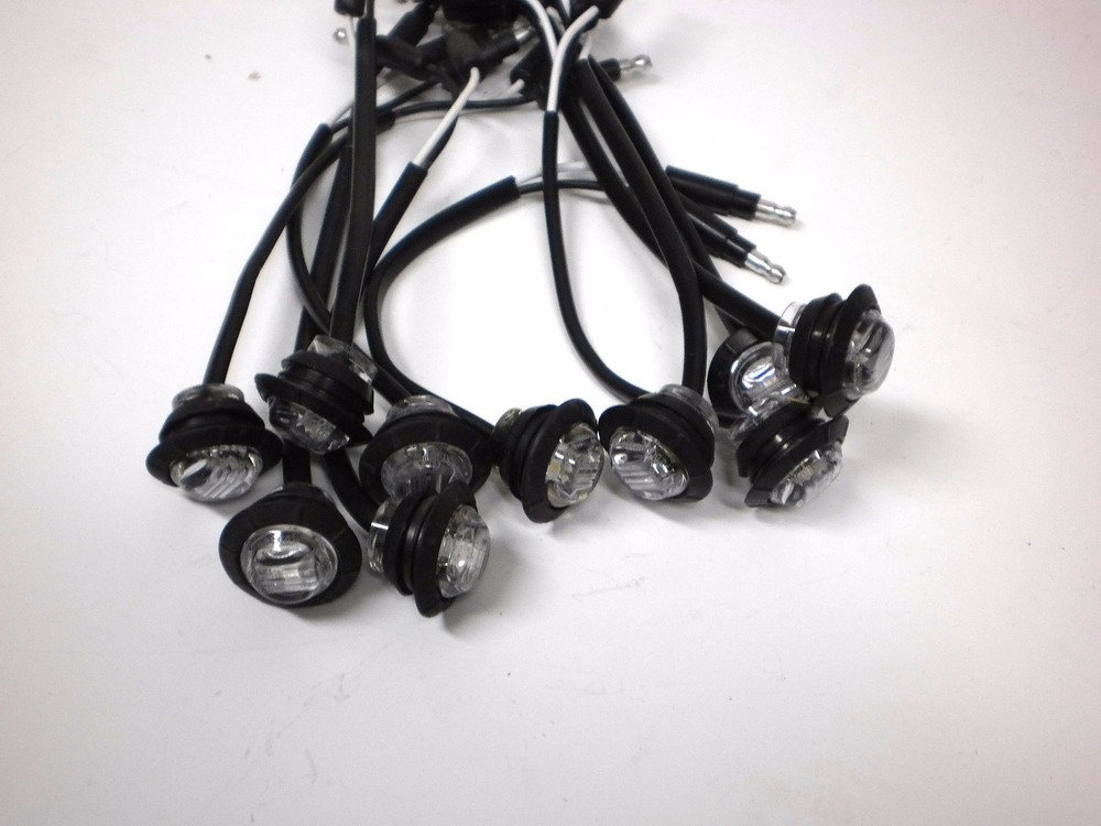 Fifteen 3/4" Maxxima Amber Clear LED Marker Lights