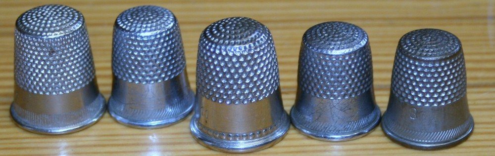 5 VINTAGE THIMBLES SOME SILVER? DONT KNOW