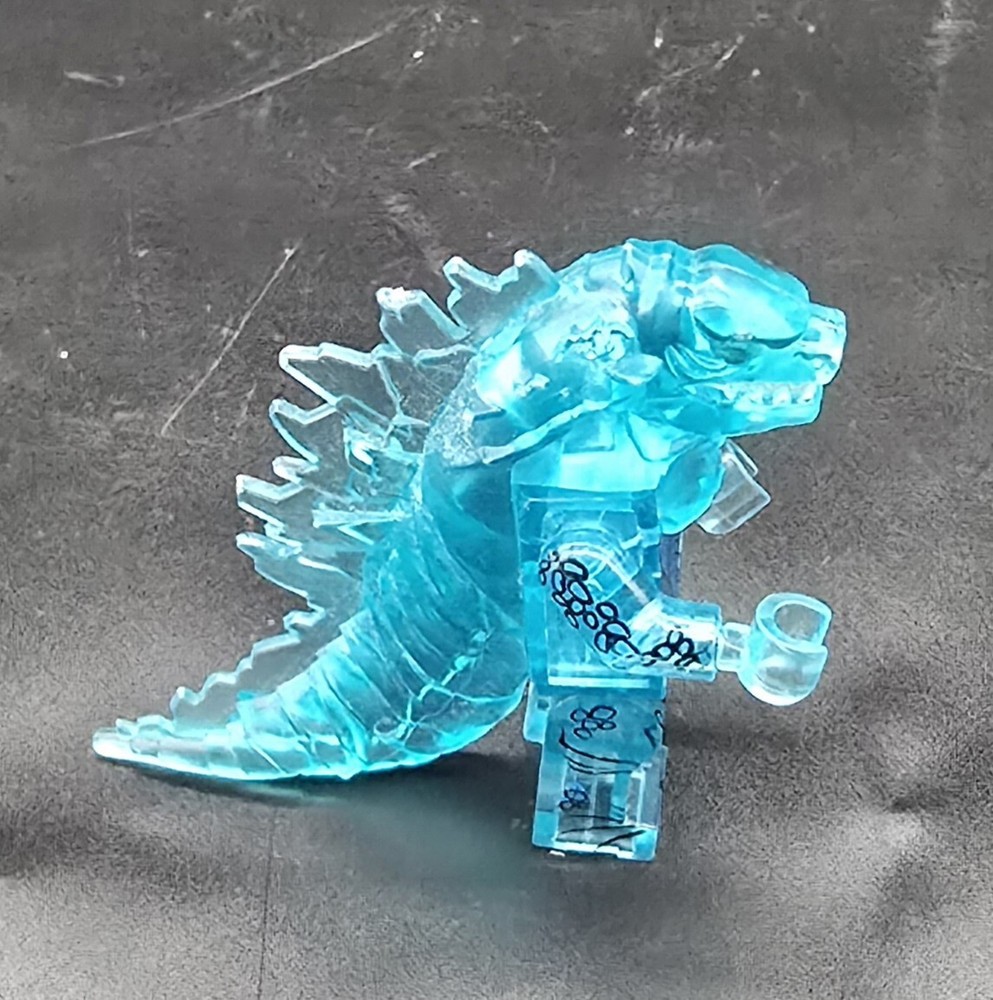 godzilla mini figure- trans neon blue ice with printed body definitions
