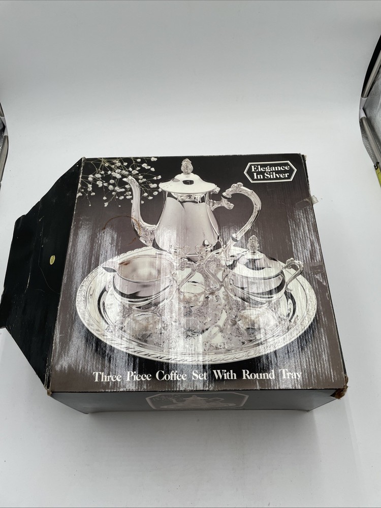vintage "Elegance in Silver" three-piece silver-plated coffee set