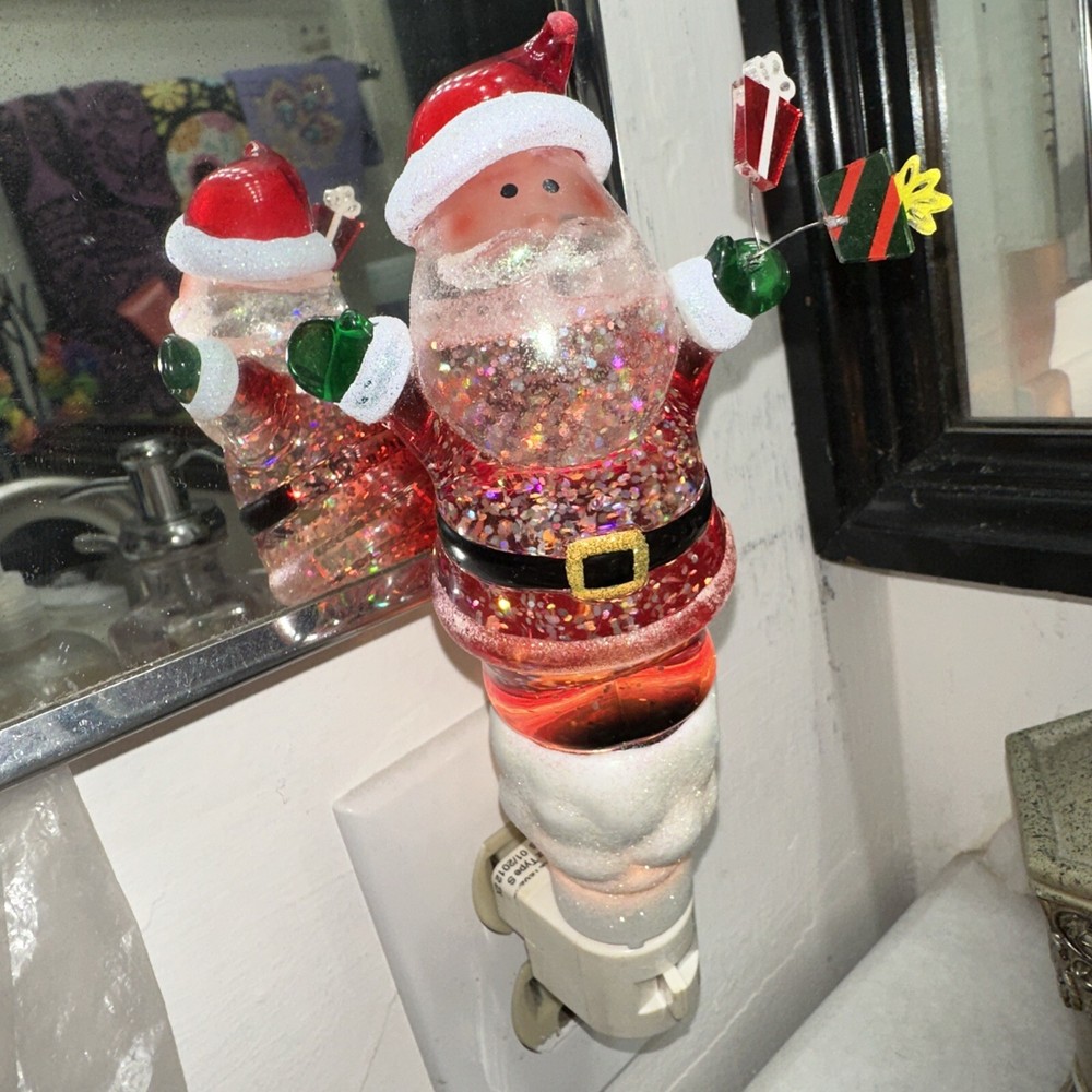 Santa night light with Jingles over his head