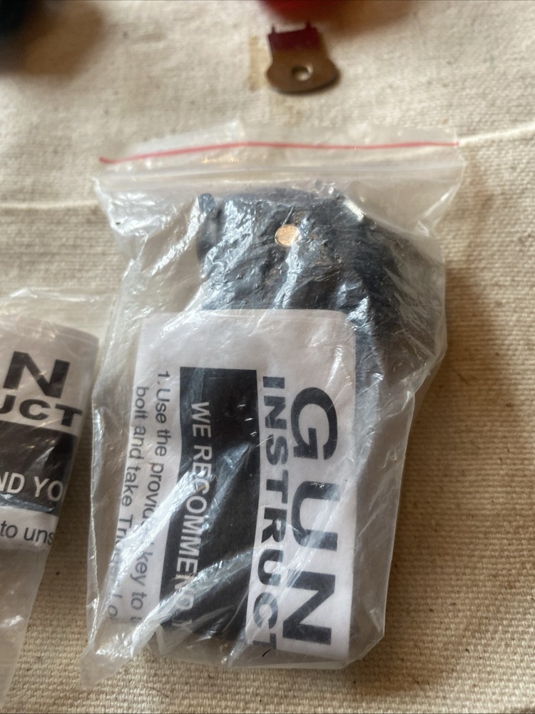 UNIVERSAL TRIGGER LOCK  SMALL POLYMER Nos