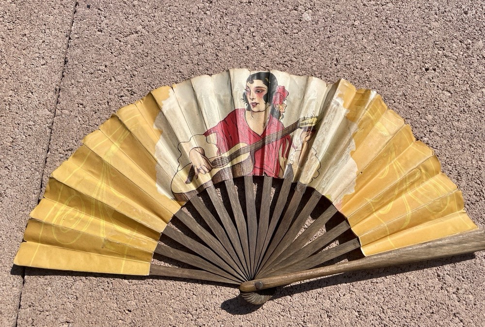 vintage advertising hand fan